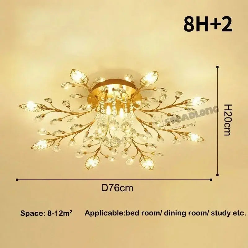 Gold-toned decorbites crystal ceiling chandelier with intricate leaf design and clear faceted crystals for living room light