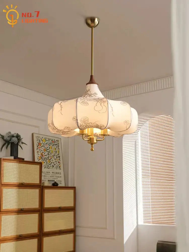 Delicate off-white pendant lights with floral embroidery and brass frame by decorbites gold lustre for dining room decor