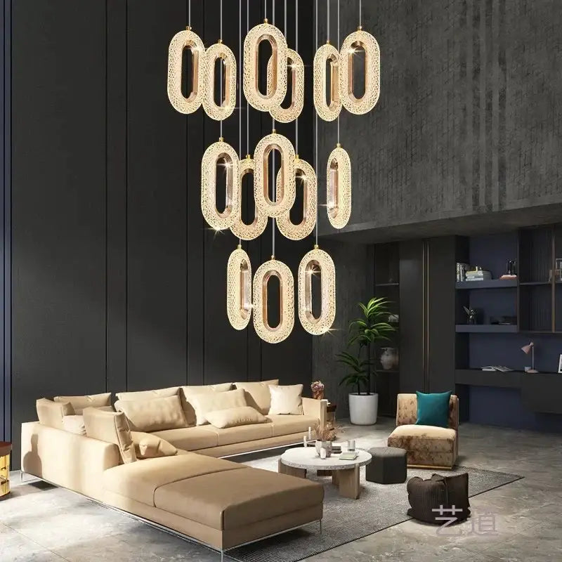 Gold lustre oval acrylic chandelier dining room pendant light with gold-toned oval frame and intricate crystal detailing