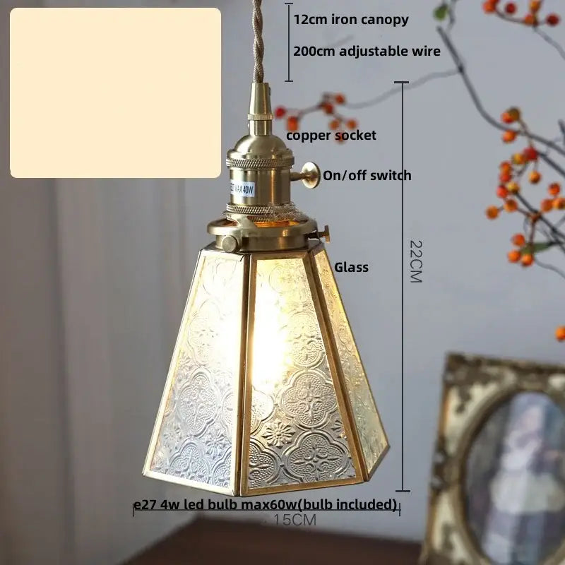 Antique brass-finished gold petal glass led pendant lamp with hexagonal embossed floral shade and adjustable iron canopy
