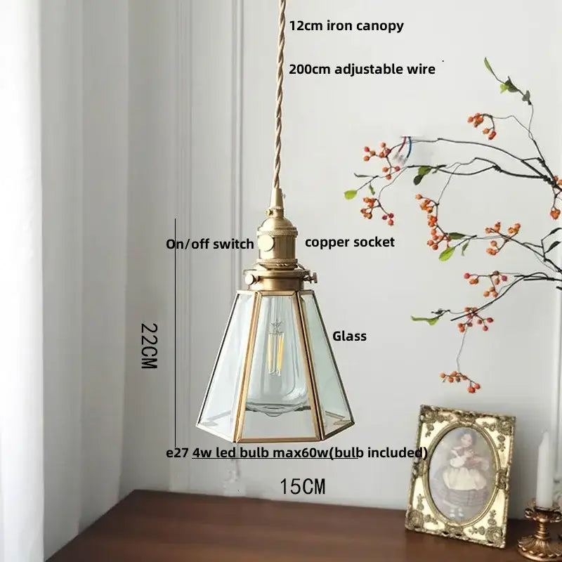 Antique brass-finished gold petal glass led pendant lamp with clear panels and visible led bulb for kitchen lighting