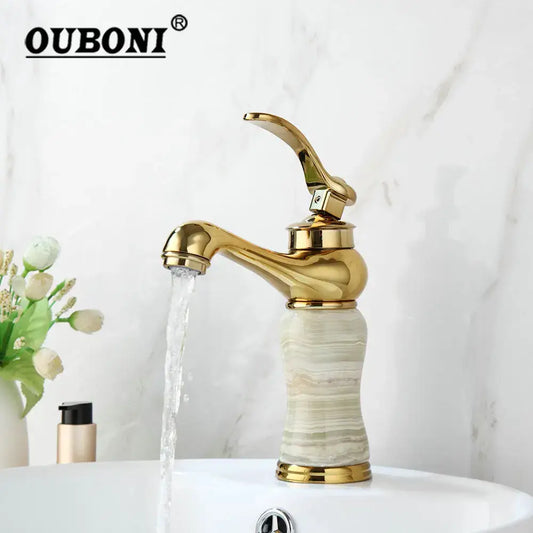 Gold plated jade bathroom faucet with gold finished curved spout and marble textured base hot cold mixer