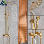 Gold-finished rozin shower faucet set with rainhead and handheld sprayer for a luxury bathroom system