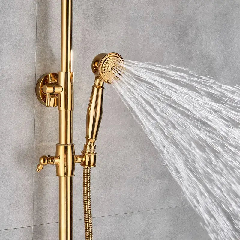 Gold-finished shower faucet set with rainfall and waterfall shower head, sleek elongated handle, and flexible hose