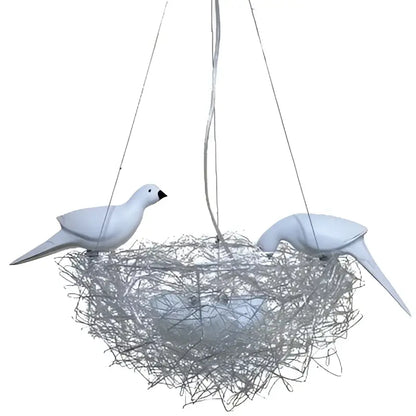 White ceramic dove figurines on silver wire nest pendant lights for elegant dining room bird’s nest lighting design