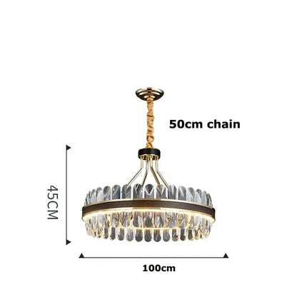 A decorbites gold stainless steel crystal chandelier with gold metal frame and clear crystals for dining room decor