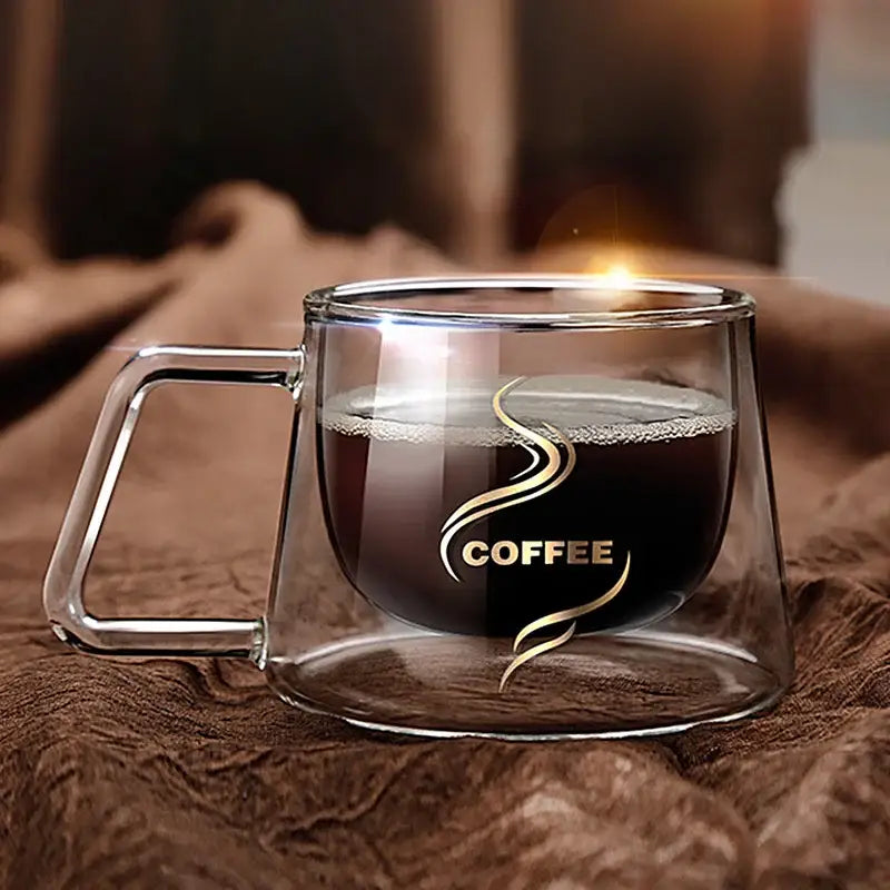 Clear decorbites glass double wall coffee mug with gold swirl logo filled with dark espresso liquid for kitchen use
