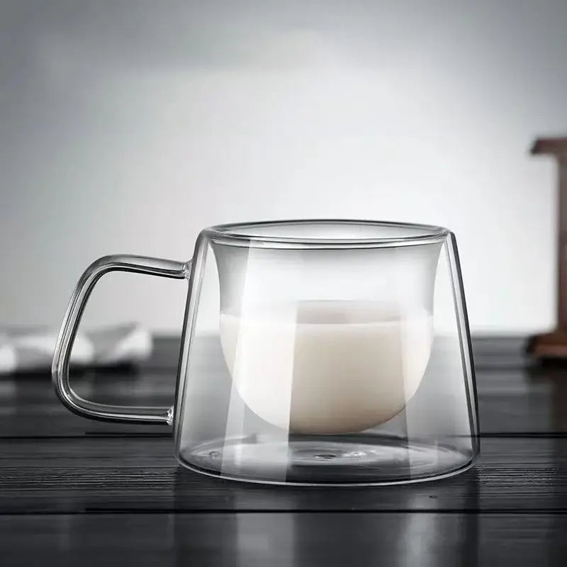 Clear double-walled glass coffee mug with gold swirl design and sturdy handle by decorbites glass double espresso cup