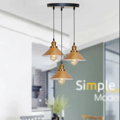 Gold vintage industrial pendant lamp with three brass conical shades and exposed filament bulbs for dining room decorbites gold vintage