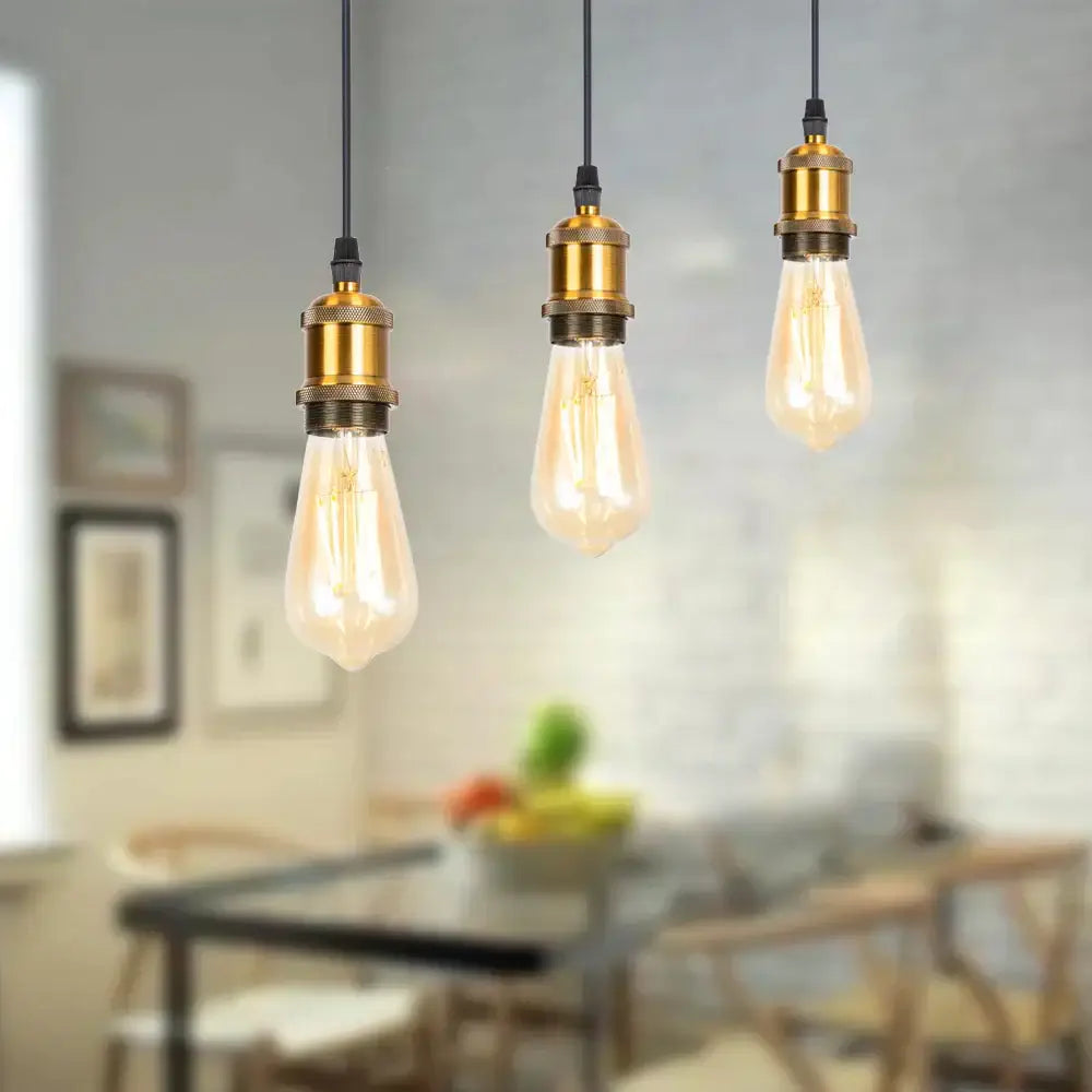 Three gold vintage industrial pendant lamps with edison bulbs and brass sockets for dining room decorbites gold vintage