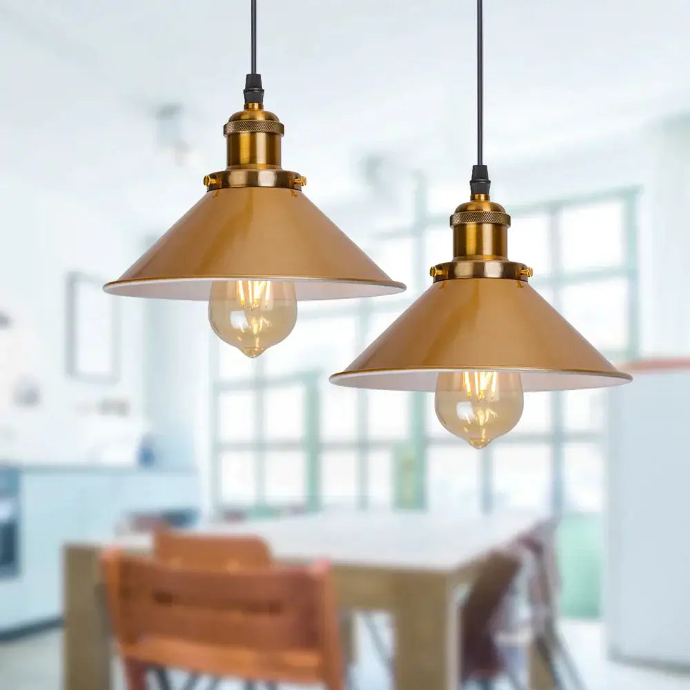 Two gold vintage industrial pendant lamps with brass metal shades and exposed filament bulbs for dining room decorbites gold vintage
