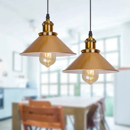 Two gold vintage industrial pendant lamps with brass metal shades and exposed filament bulbs for dining room decorbites gold vintage