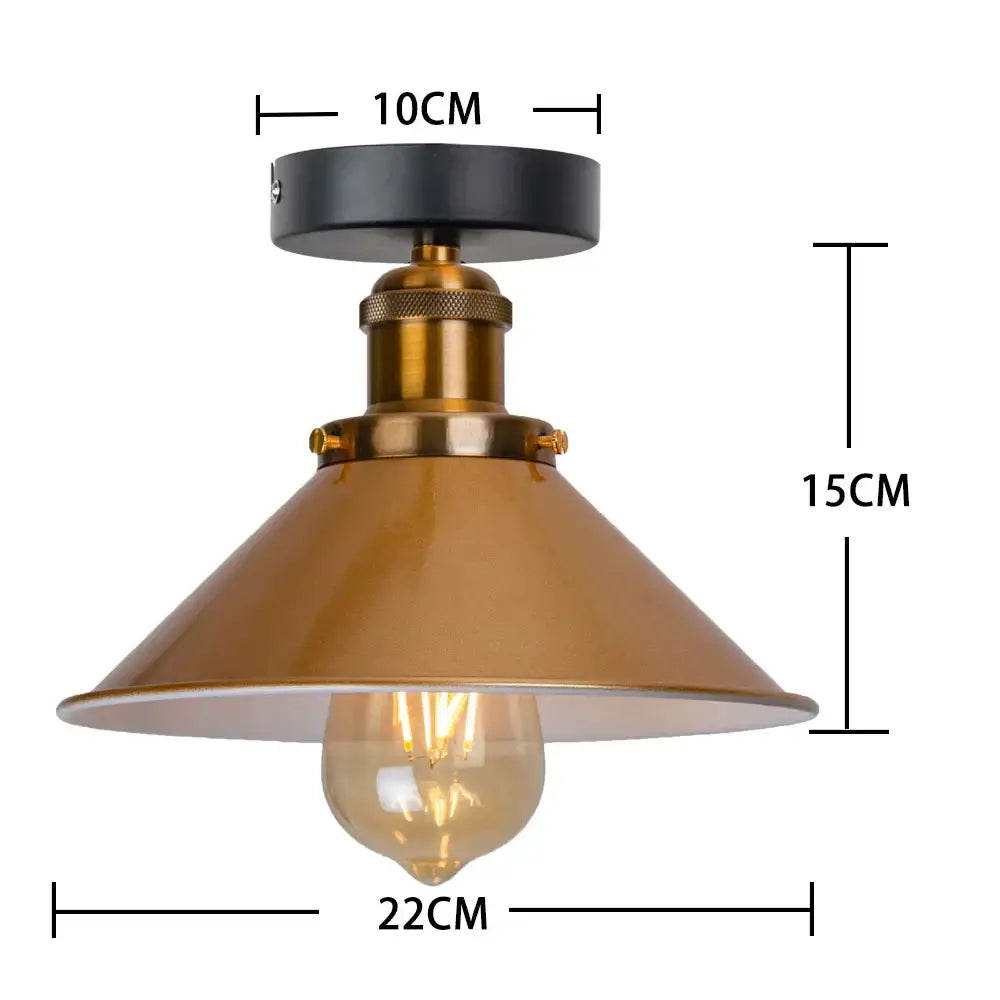 Gold vintage industrial pendant lamp with three brass conical shades and black mounting base featuring exposed bulbs