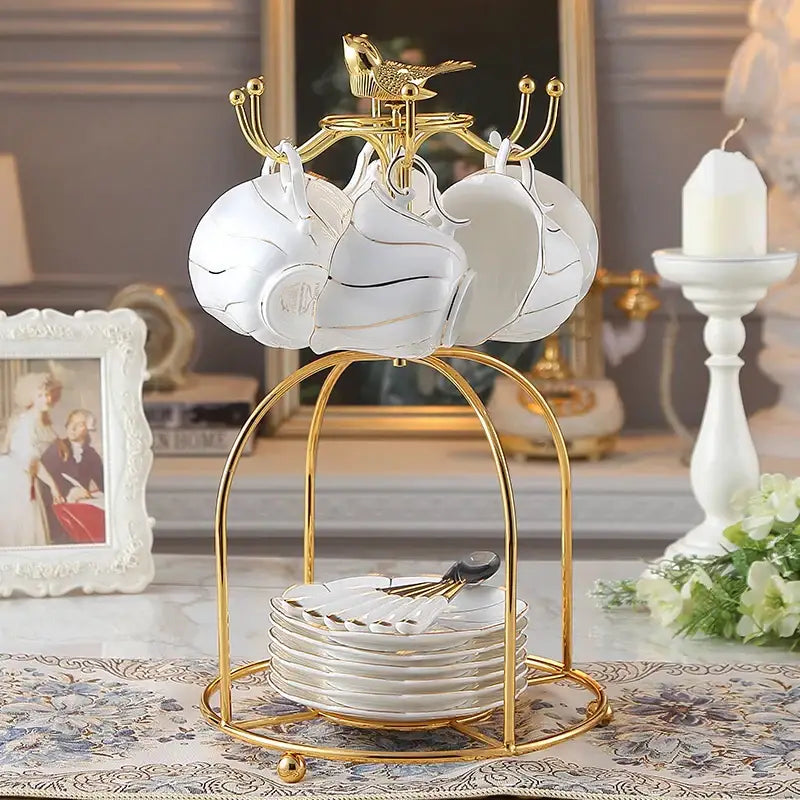 Gold wave white bone china cup set with gold-toned metal rack decorbites gold wave porcelain tea set for dining room