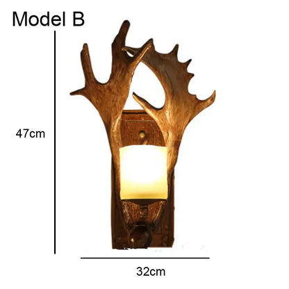Golden antler deer horn wall lamp with warm glowing light and rustic wooden base by decorbites deer horn for living room decor
