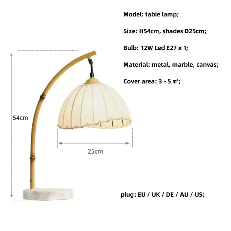 Cream cream canvas lampshade with ruffled edges on a decorbites bamboo shaped led floor lamp with marble base