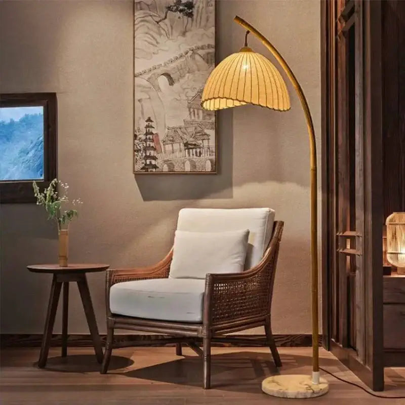 Golden bamboo shaped led floor lamp with marble base featuring a woven bamboo shade for living room decorbites floor lamp
