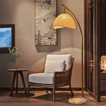 Golden bamboo shaped led floor lamp with marble base featuring a woven bamboo shade for living room decorbites floor lamp