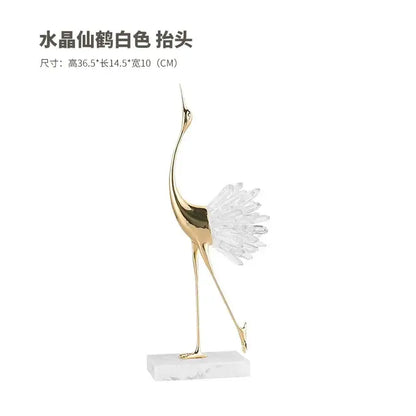 Elegant white crystal crane figurine with golden bird agate body and slender legs on bird agate marble base for home decor