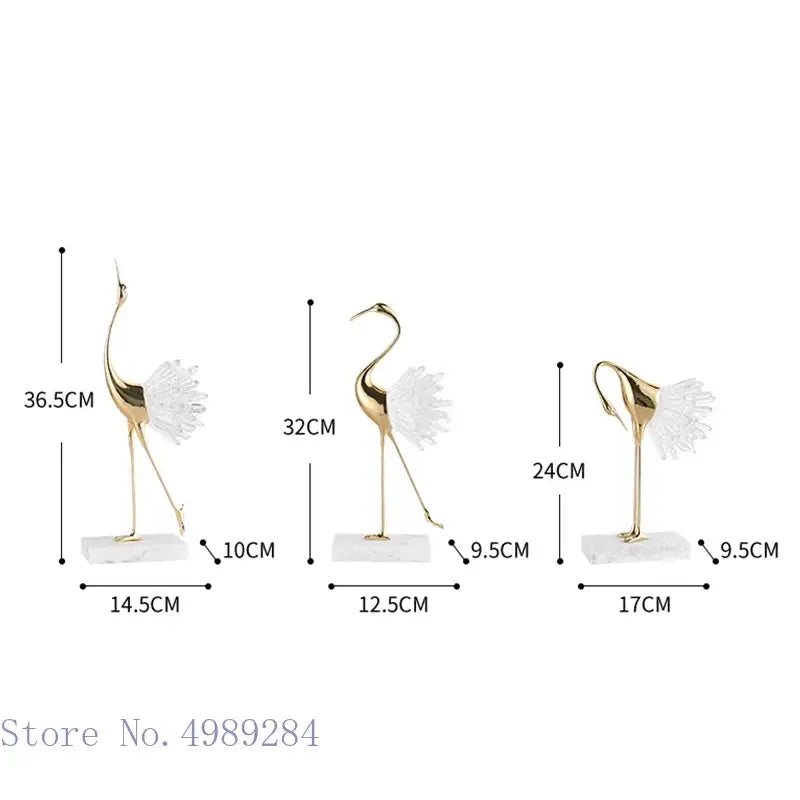 Three elegant gold-colored bird agate marble crane statues with translucent white wings on marble bases for home decor