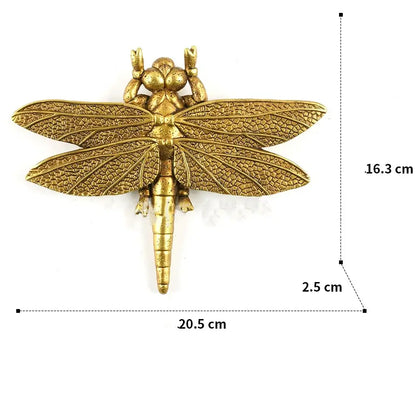 Golden bird and butterfly resin wall decor featuring a golden dragonfly metal brooch with detailed wing veining and segmented body