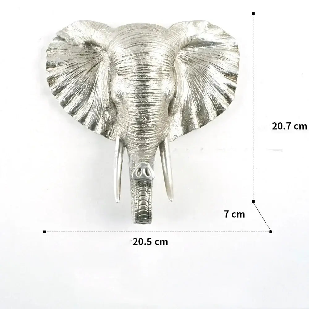 Silver metallic elephant head wall decor with textured surface and detailed tusks complementing decorbites golden bird butterfly resin wall
