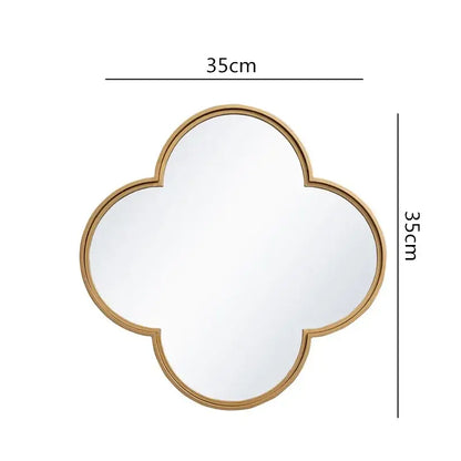 A 35cm square gold-framed quatrefoil mirror with a golden border geometric plum flower design for living room decor