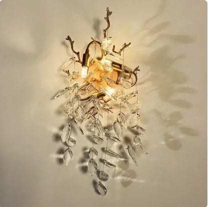 Gold-toned wall sconce with crystal leaf and branch accents for living room decorbites golden branch crystal chandelier