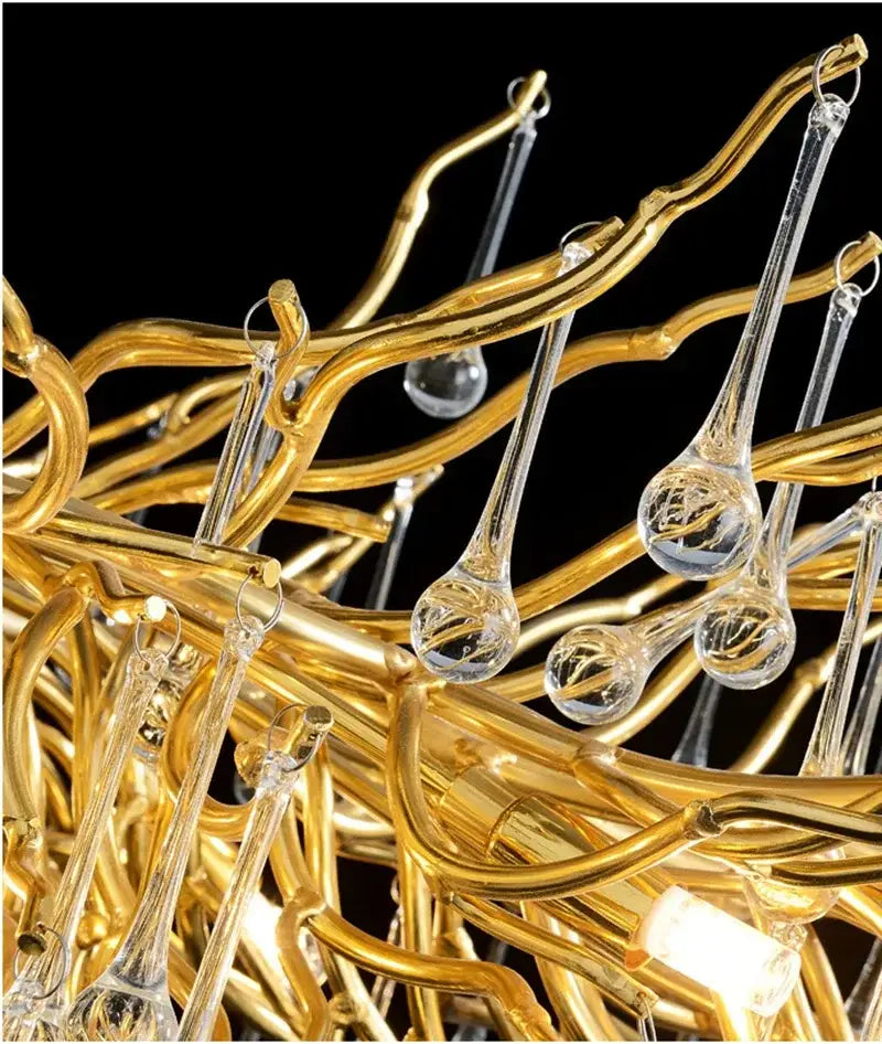 Golden branch crystal chandelier with intricate branching arms and clear teardrop pendants for living room decorbites golden branch