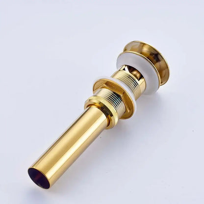 Golden brass vintage bathroom sink pop up drain with gold-toned metal and white ceramic accents for decorbites golden brass decor