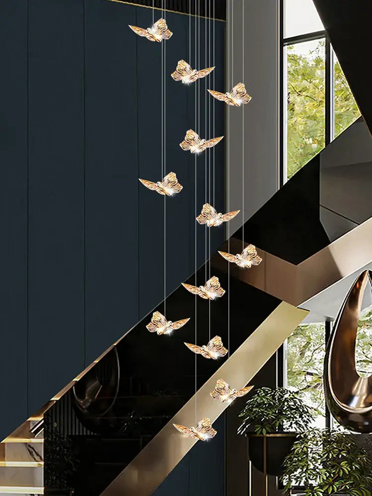 Golden butterfly chandelier pendant lights suspended from the ceiling ideal for butterfly chandelier staircase decor