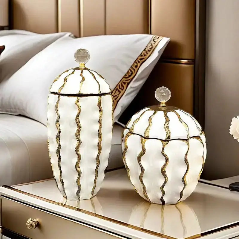 White ceramic decorative jars with gold wavy stripes and crystal knobs from decorbites golden checkmate ceramic collection