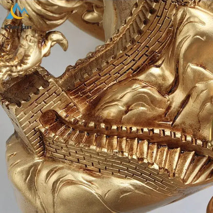 Golden metallic dragon sculpture with intricate brickwork detailing on decorbites crystal eagle wall lamp for living room decor