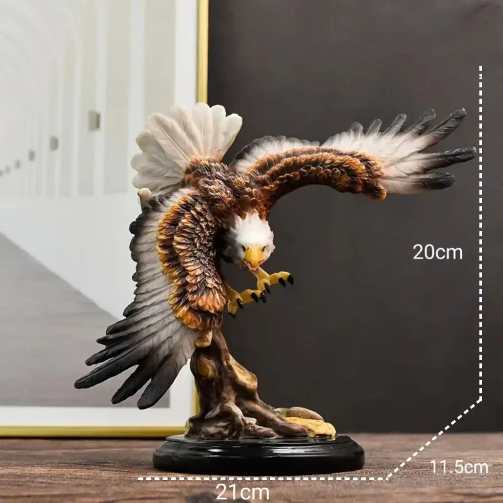 Detailed resin golden dapeng eagle wings statue with white head brown body perched on gnarled branch for office decor