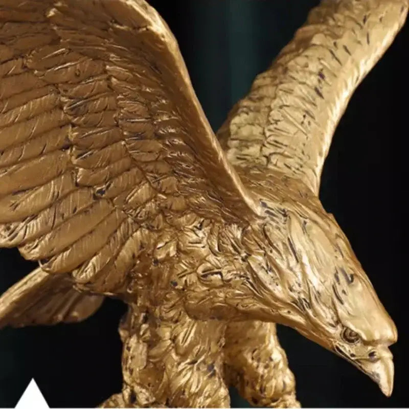 Golden dapeng eagle wings resin statue with detailed feather texture and fierce expression for office decor by decorbites