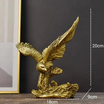 Golden dapeng eagle wings resin statue with detailed feathering on rocky base for office decor by decorbites dapeng eagle