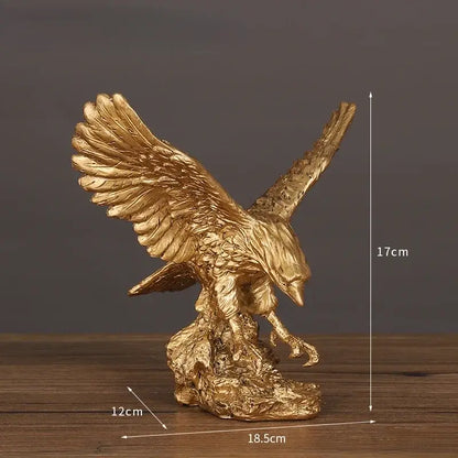 Golden dapeng eagle wings resin statue with detailed feather texture on rocky base for office decor by decorbites