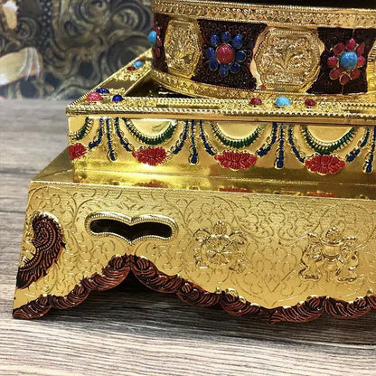 Golden alloy plates featuring eight auspicious buddha with ornate embossed patterns and gemstone accents for temple meditation
