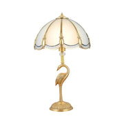 Golden flamingo-shaped table lamp with peacock feather beveled glass shade for living room nightstand lighting