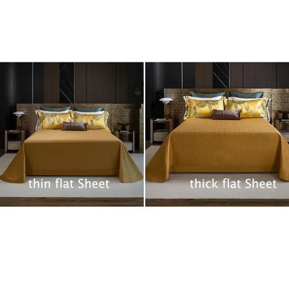 Golden satin flat sheet with subtle textured weave and matching embroidered pillowcases in a decorbites jacquard bedding set