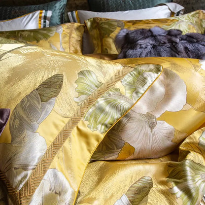 Golden floral satin jacquard bedding set pillow sham with intricate green and cream embroidery and subtle woven border