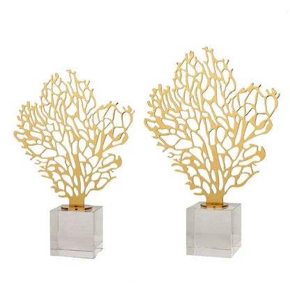 Golden hollow tree coral sculpture with intricate cut-out patterns on clear acrylic bases for living room decorbites decor