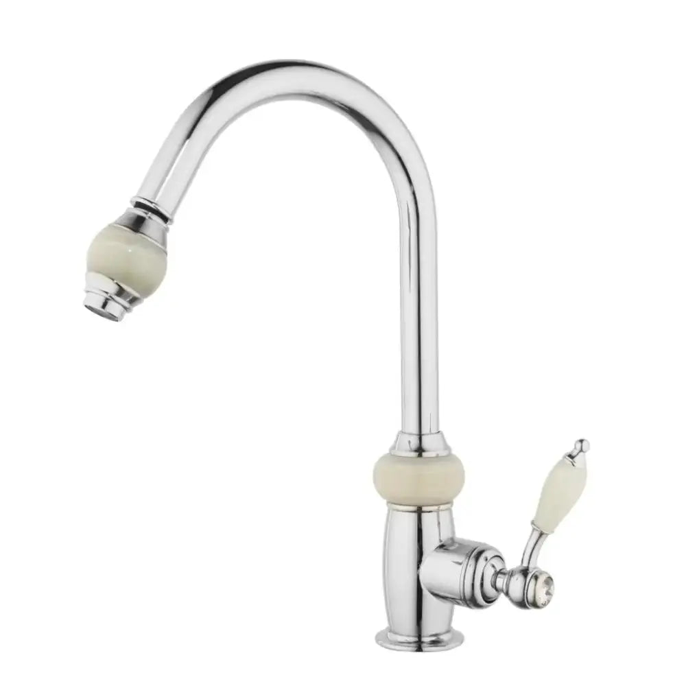 Chrome finished kitchen faucet with cream ceramic spout accents and curved design featuring golden jade diamond handle