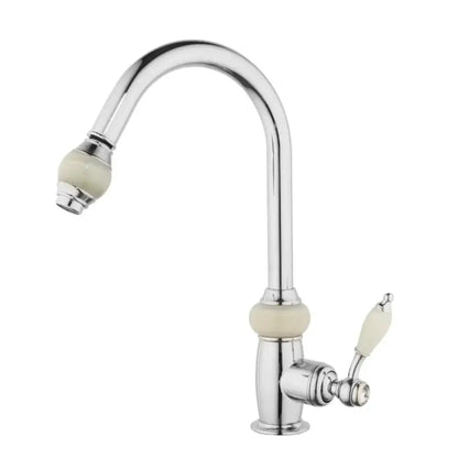 Chrome finished kitchen faucet with cream ceramic spout accents and curved design featuring golden jade diamond handle