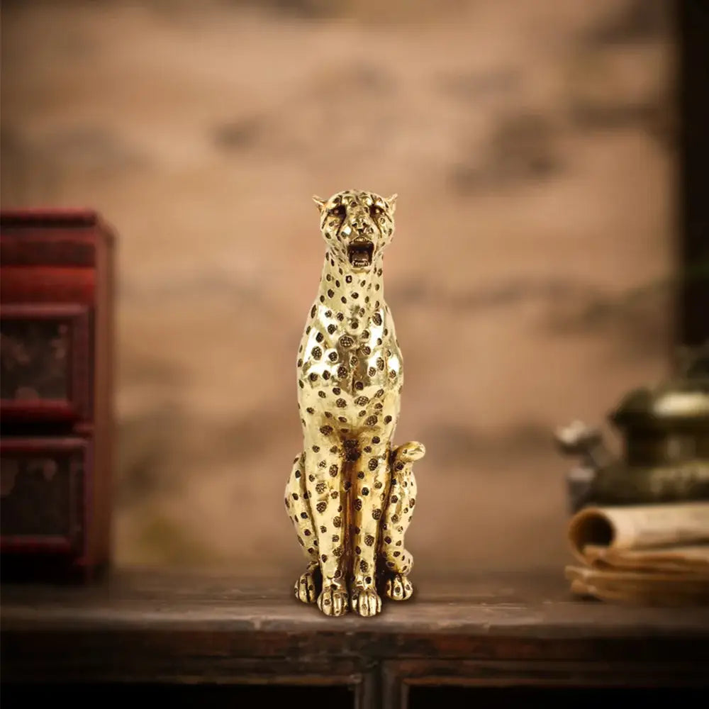 Golden leopard cheetah figurine with detailed spotted pattern and polished metallic finish for living room decor