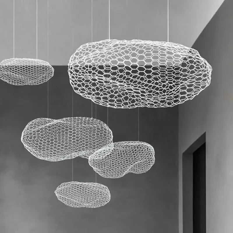 White honeycomb-patterned cloud-shaped pendant light by decorbites cloud light for warm nordic designer pendant decor