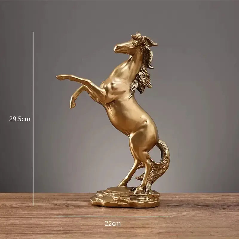 Golden metallic horse resin sculpture with detailed mane and tail on rocky base for living room decorbites horse decor