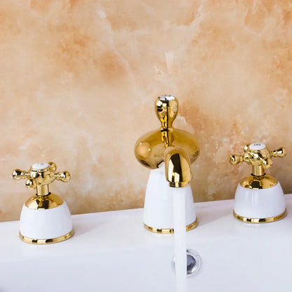 Golden plated bathroom faucet set with white ceramic cross-handle controls by decorbites for elegant decor