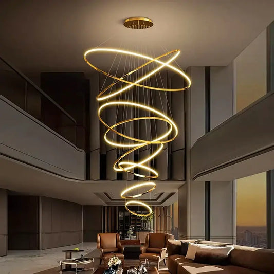 Golden spiral led pendant light chandelier with illuminated rings suspended from ceiling for dining room pendant light