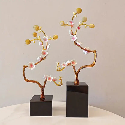 Golden tree pink and white metal decor figurine with delicate cherry blossom flowers on sleek black bases for living room